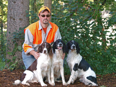 Geeb with his dogs Pike, Kaz and Rico